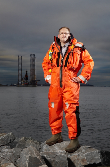 Environmental Corporate Portrait of man standing near oil rig in Halifax for Certified Management Accountants advertising campaign - copyright Harry Gils